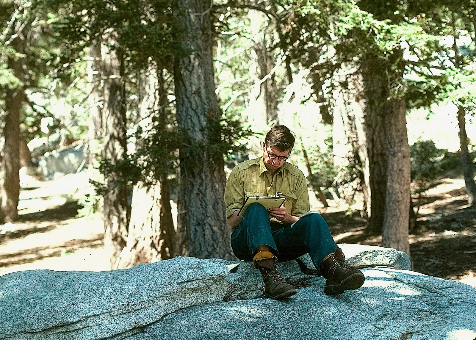 Theodore L Hullar, taking a moment to write his thoughts while participating in a week-long backpack expedition to my research field sites